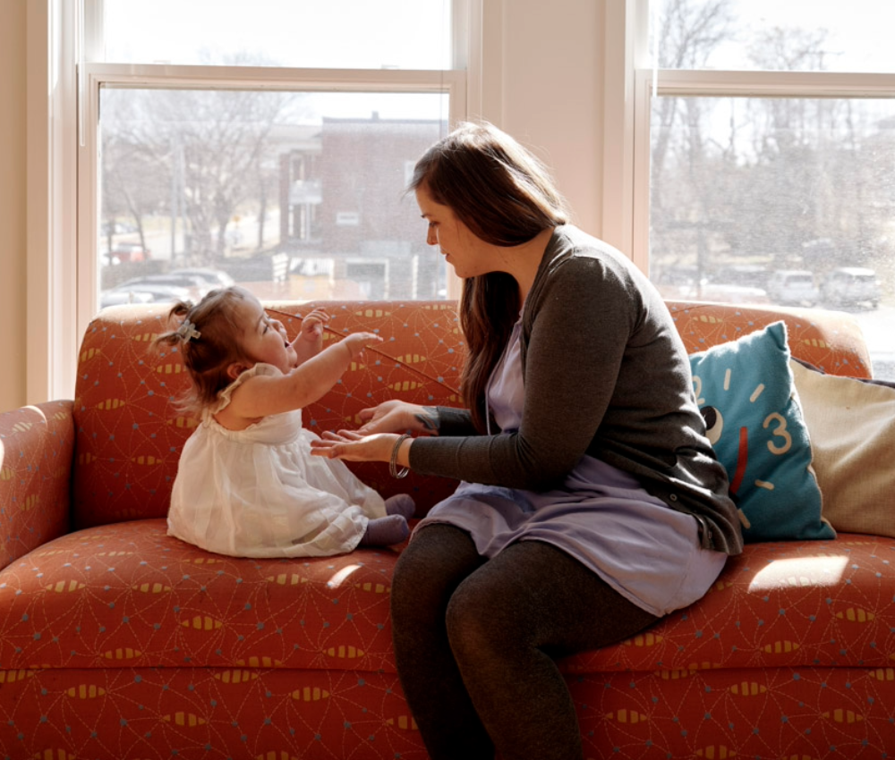 Mom and daughter on sofa